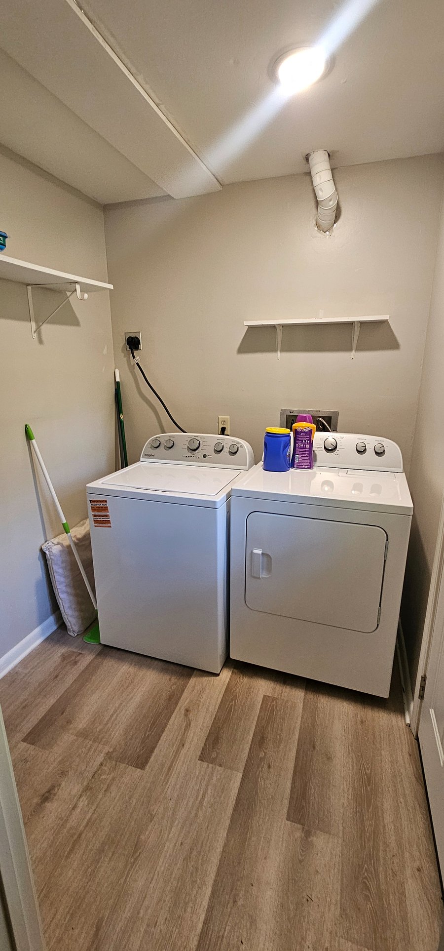 Laundry room/mudroom leading to back yard.