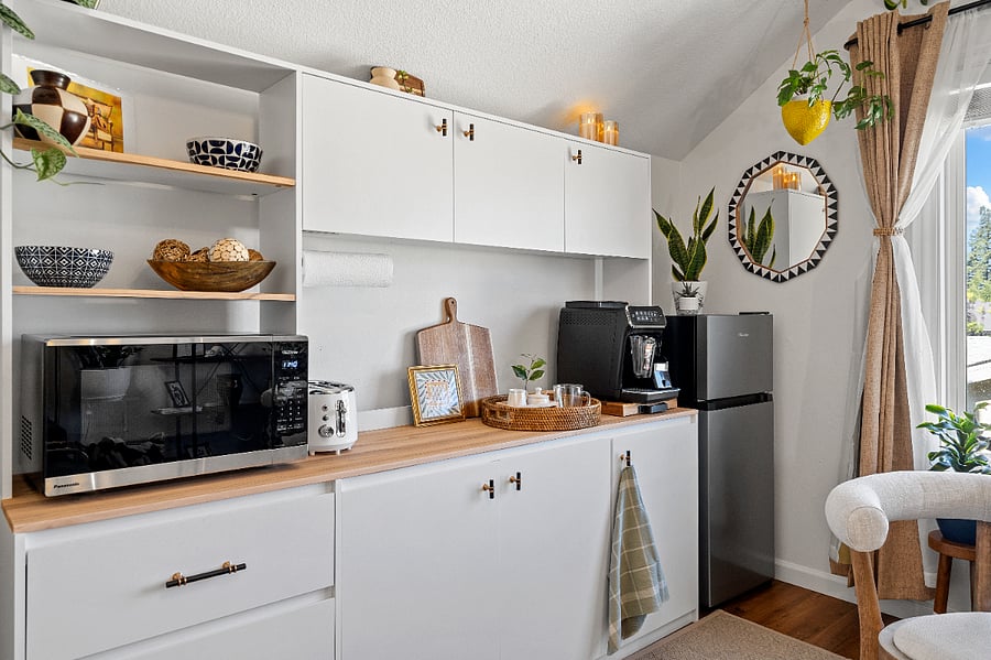 Private upstairs lounge with fully stocked kitchenette and mini fridge 