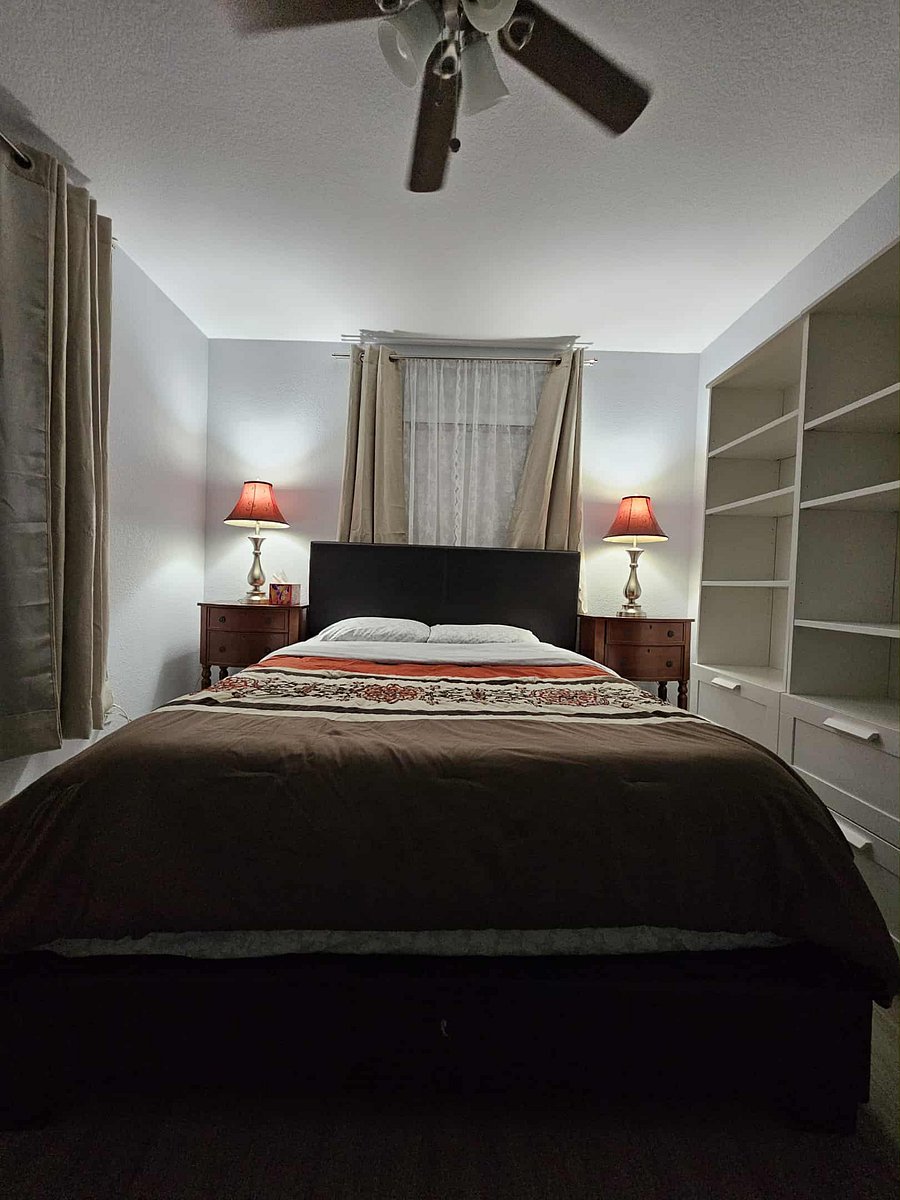 Queen-sized bed with linens