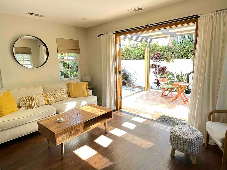 Living room opens up to private patio bringing the outside inside.