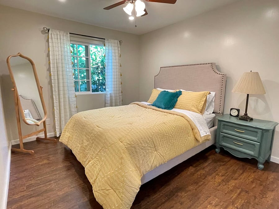Large bedroom with queen bed and sizable closet for all your clothes.