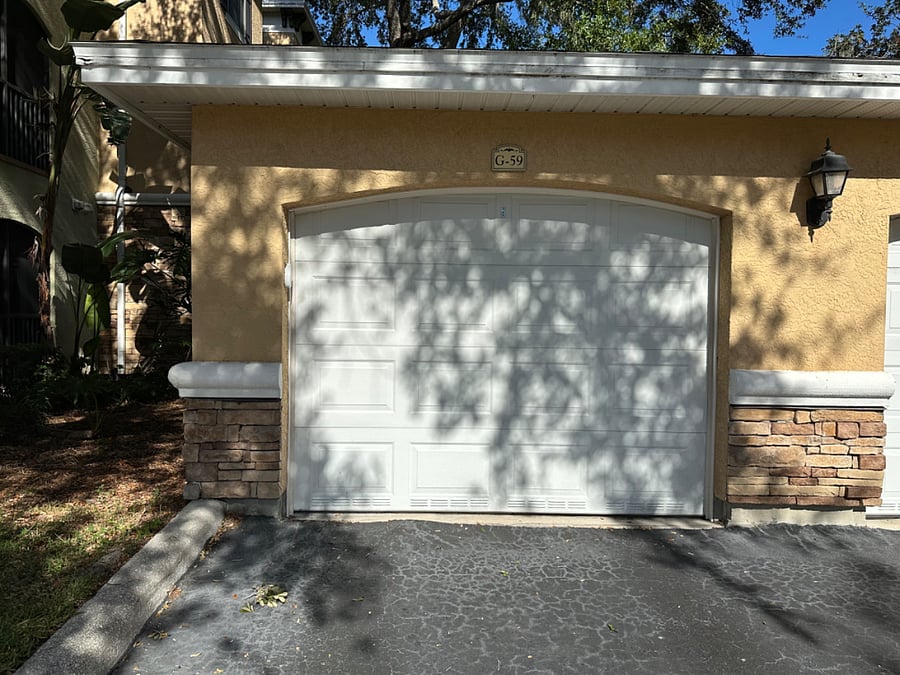Private garage with remote control access and one dedicated parking space in front of garage as well.
