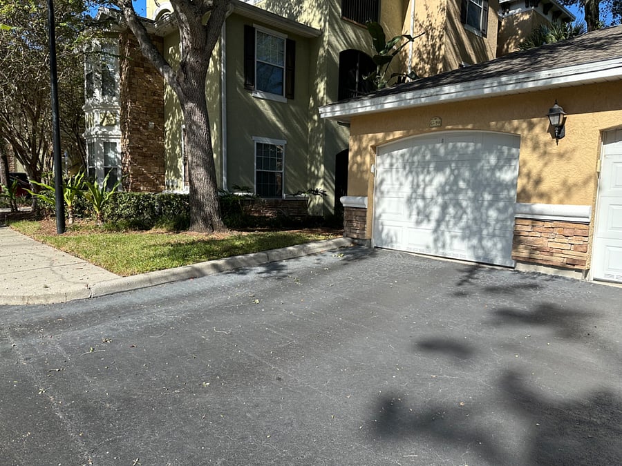 Private detached garage located right next to building.