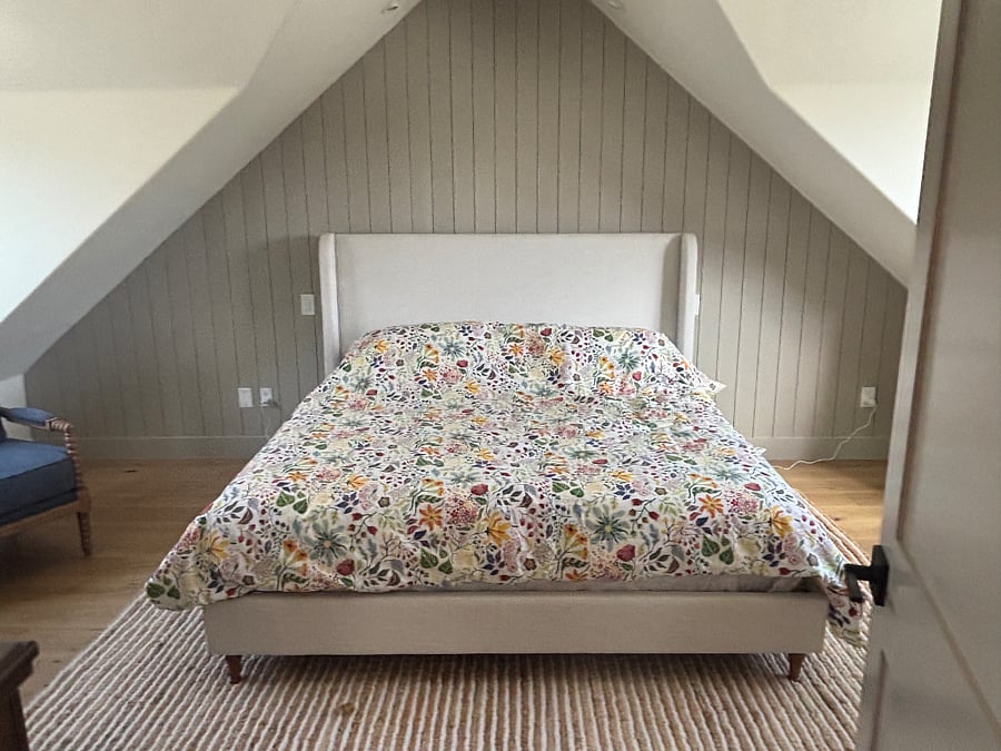 King bed in primary bedroom on top floor