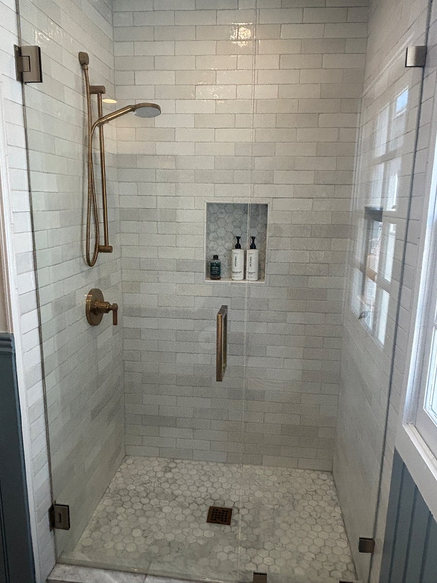 Shower in full bathroom on main level