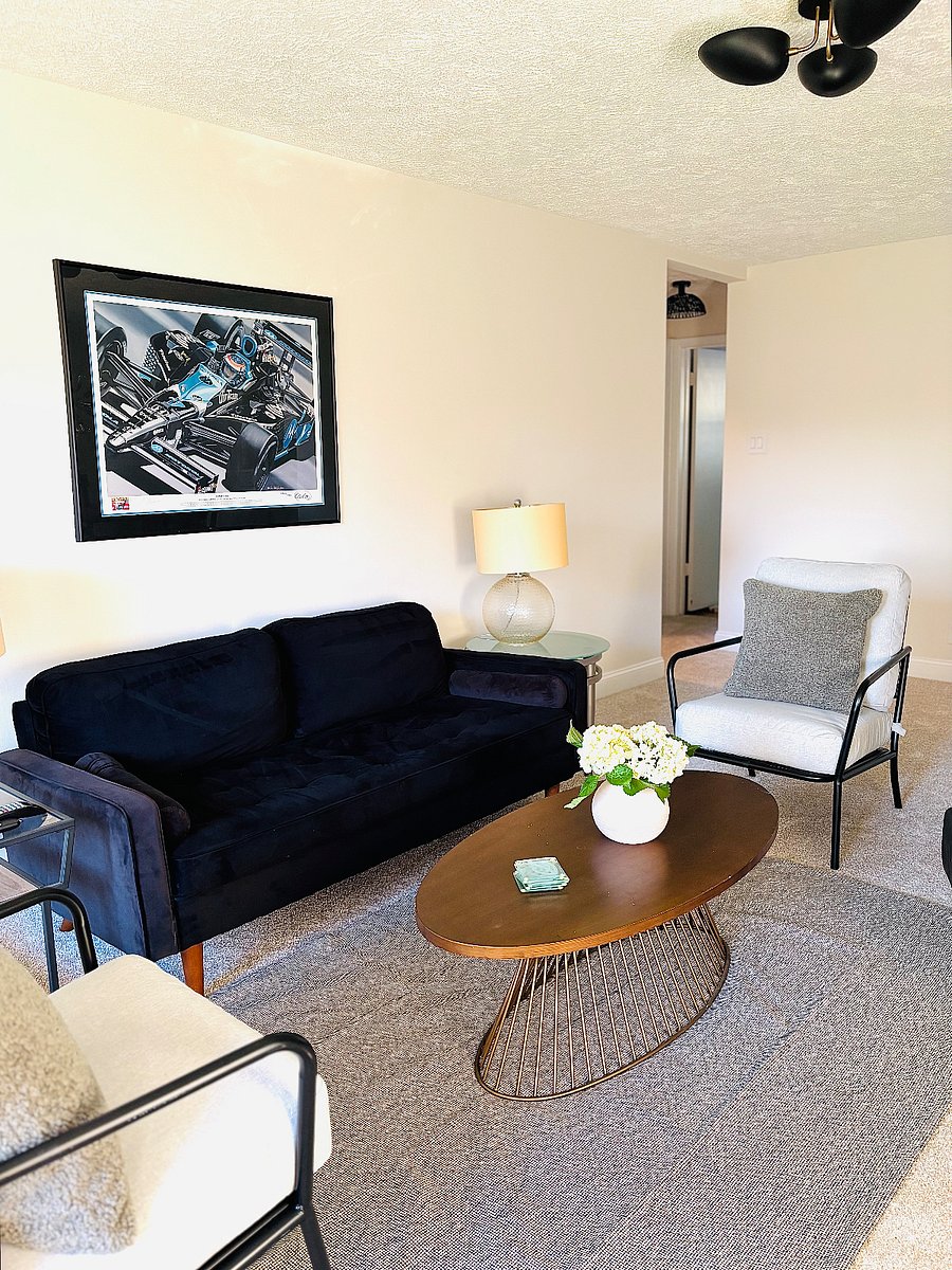 Living Room leading to hallway of the 3 bedrooms and bath upstairs