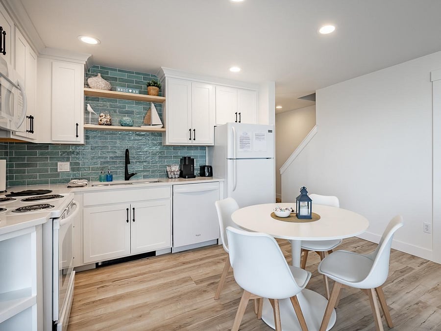 Bright modern kitchen and dining area with cozy charm