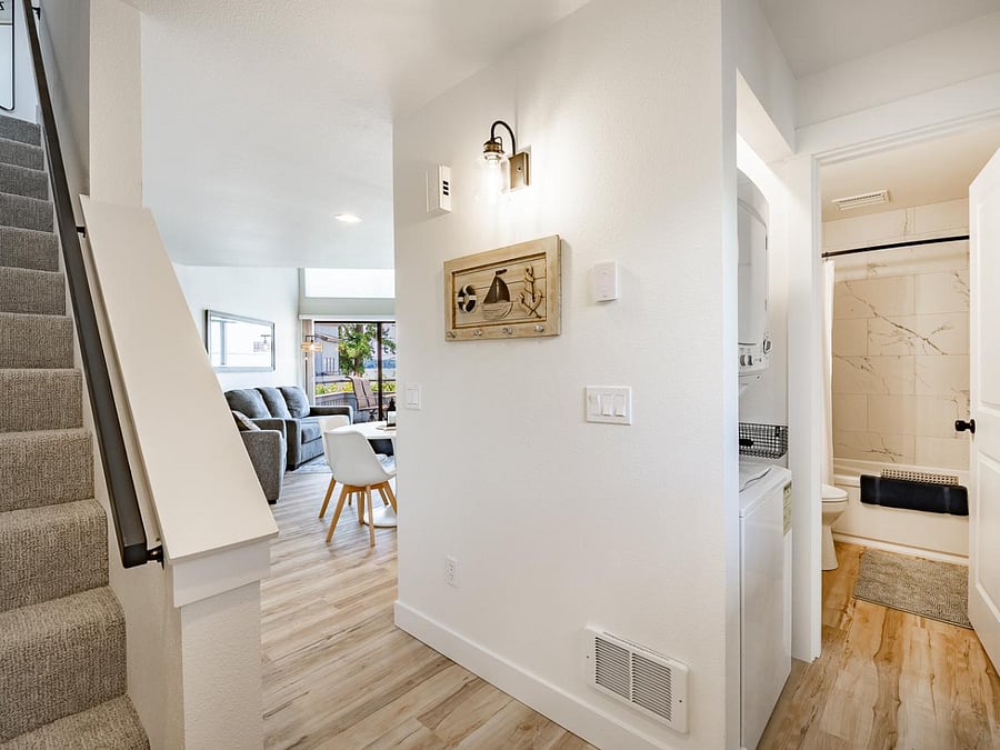 Bright and airy entryway leading to open living spaces
