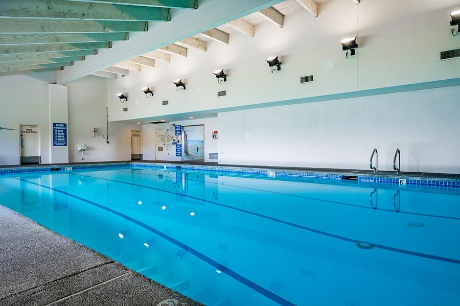 Indoor pool with bright spacious swim lanes for all ages