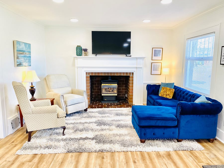 Living room with electricc(remote operated) fireplace.