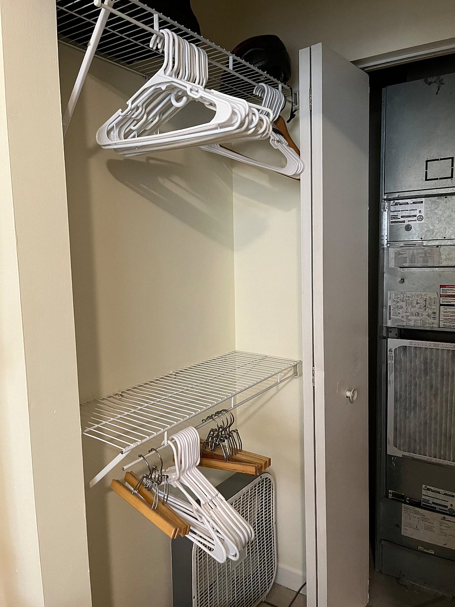 Closet with recently serviced HVAC. Efficient heating and cooling.