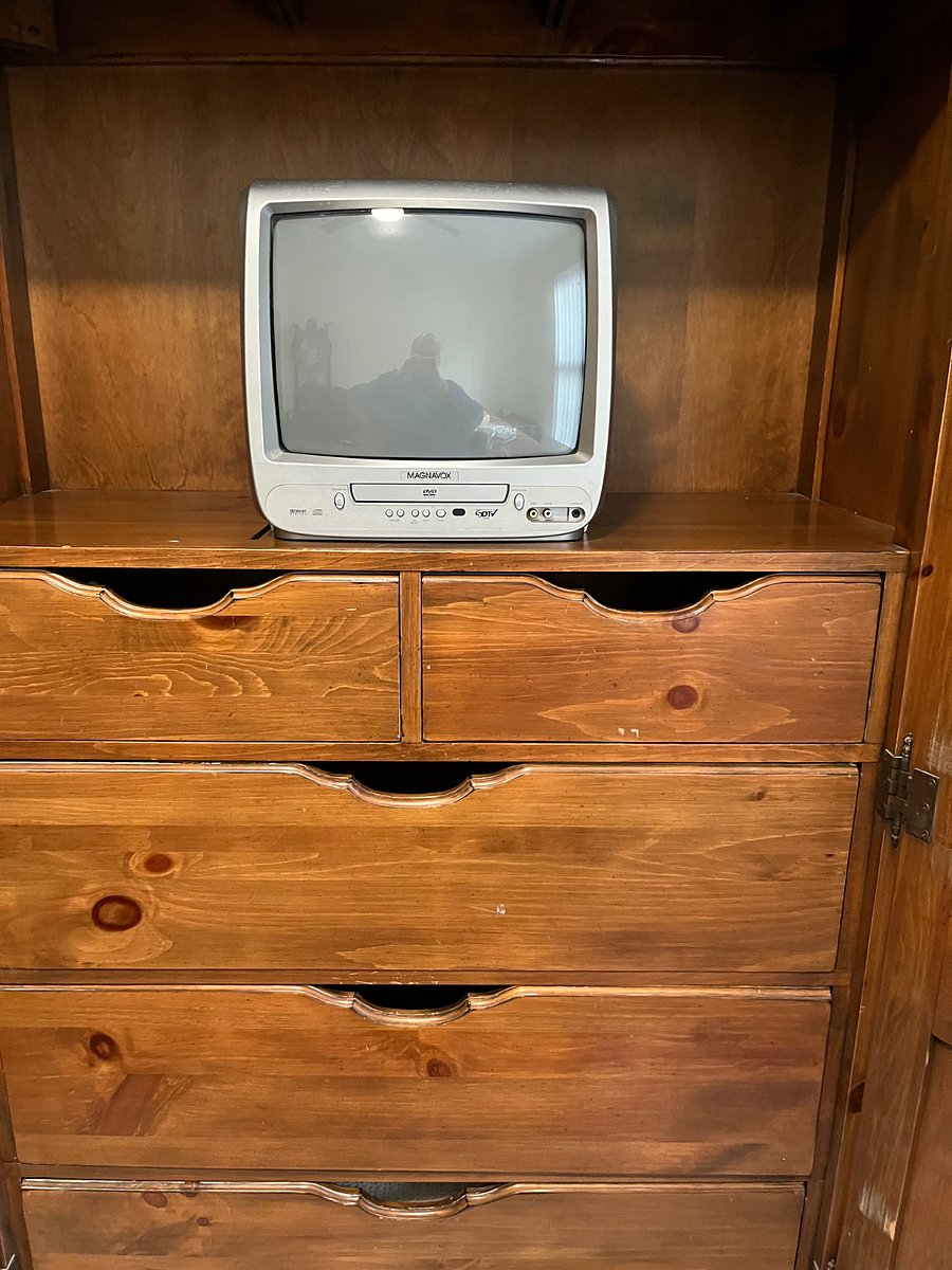 Abundant drawer space in both armoire and chest of drawers.
