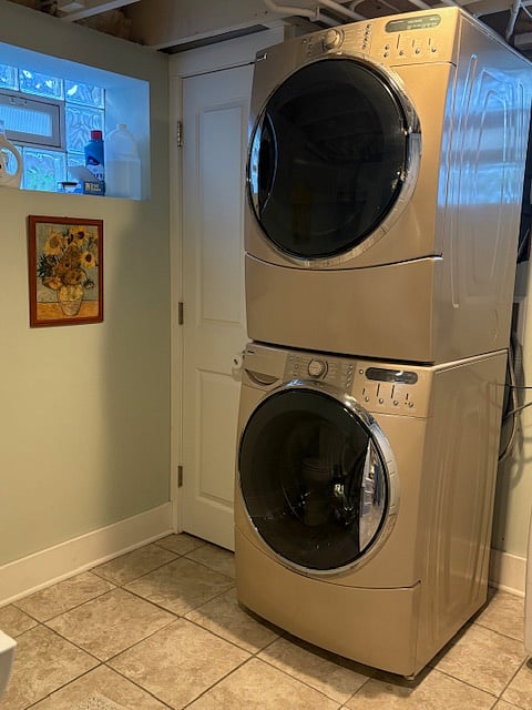 Front load washer and dryer located in the unit