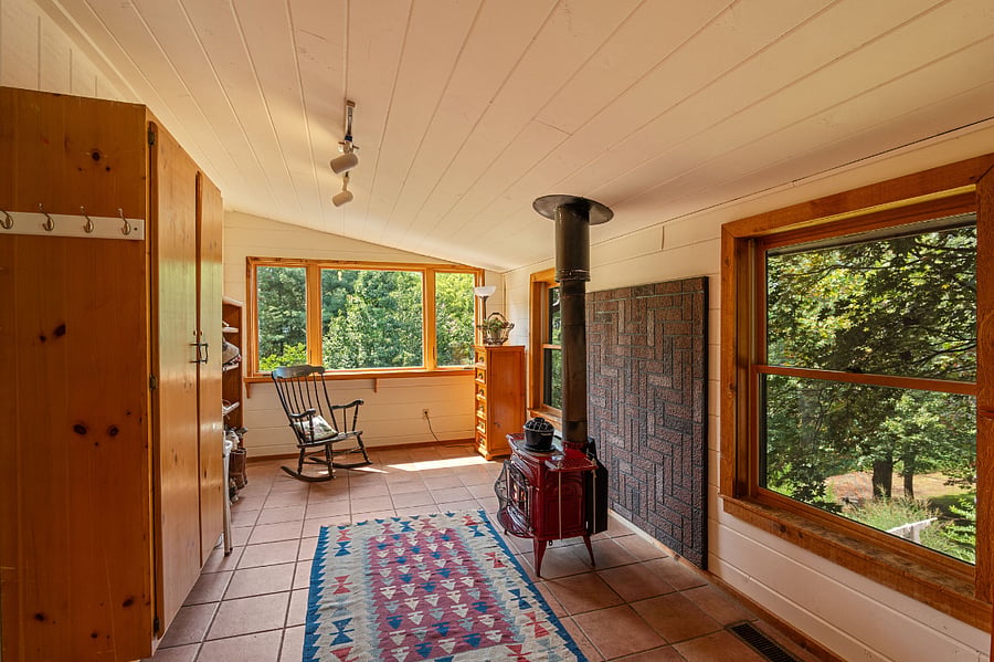 Entry sun room with wood stove