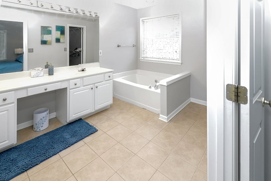 Step into the full bathroom and enjoy a sleek walk-in shower, modern fixtures, and a fresh, clean design that makes getting ready a pleasure.