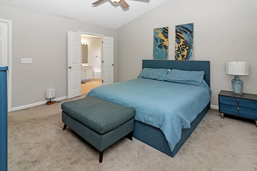 You'll love this cozy bedroom featuring a comfy queen bed with soft, inviting linens that make it easy to relax and feel right at home.