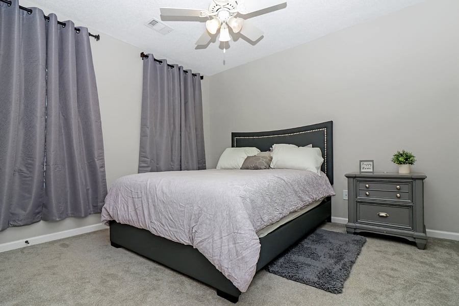 Youll love this cozy bedroomfeaturing a comfy queen bed with soft, inviting linens that make it easy to relax and feel right at home.