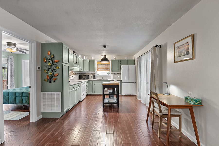 Home has two work spaces, one in main living area and another in the guest suite.