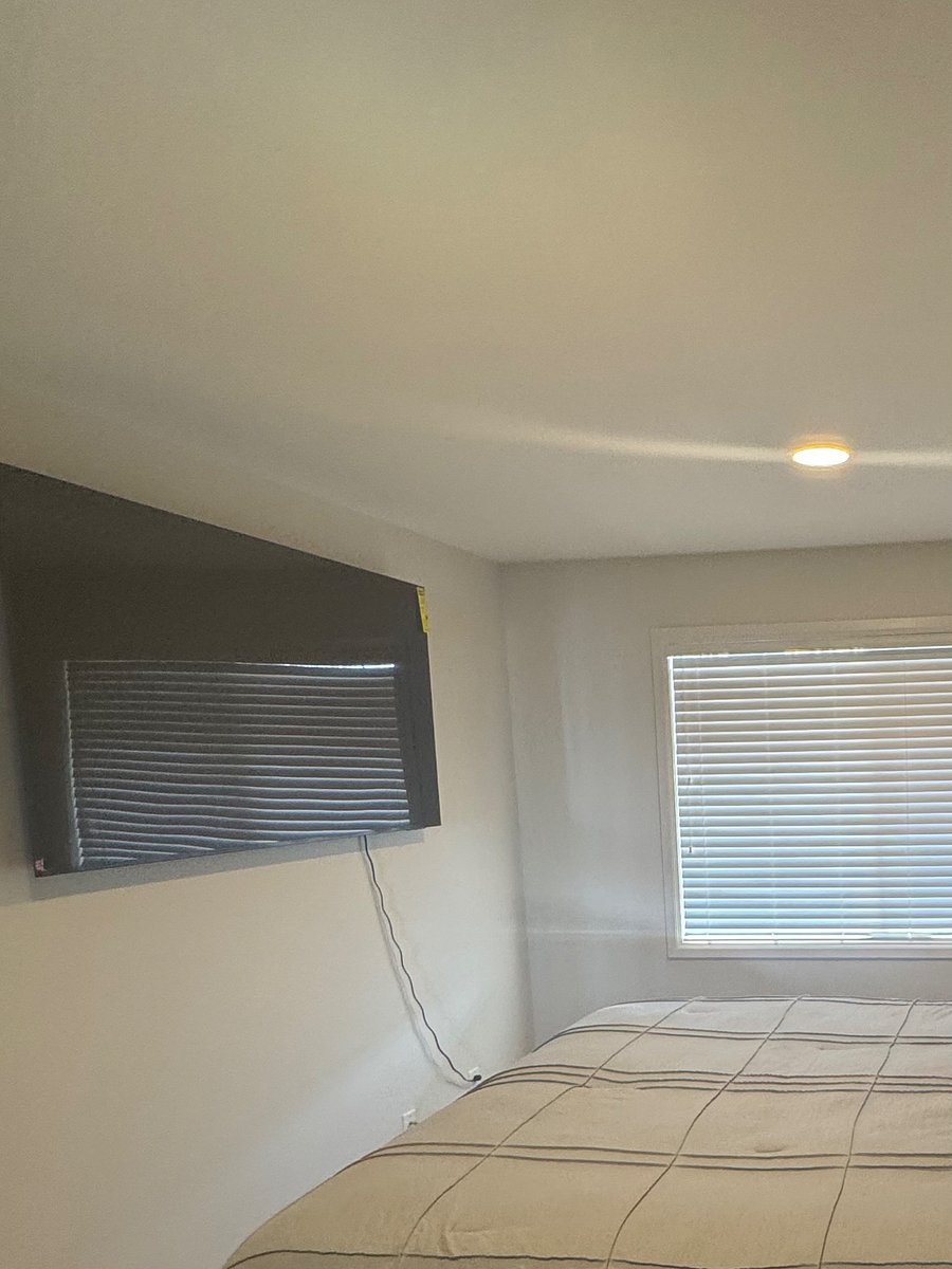 Mounted smart TV in master