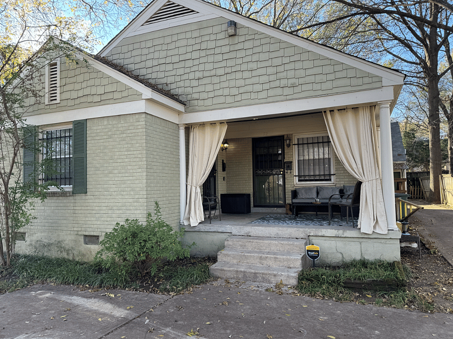 Off-street parking pad in front of the duplex