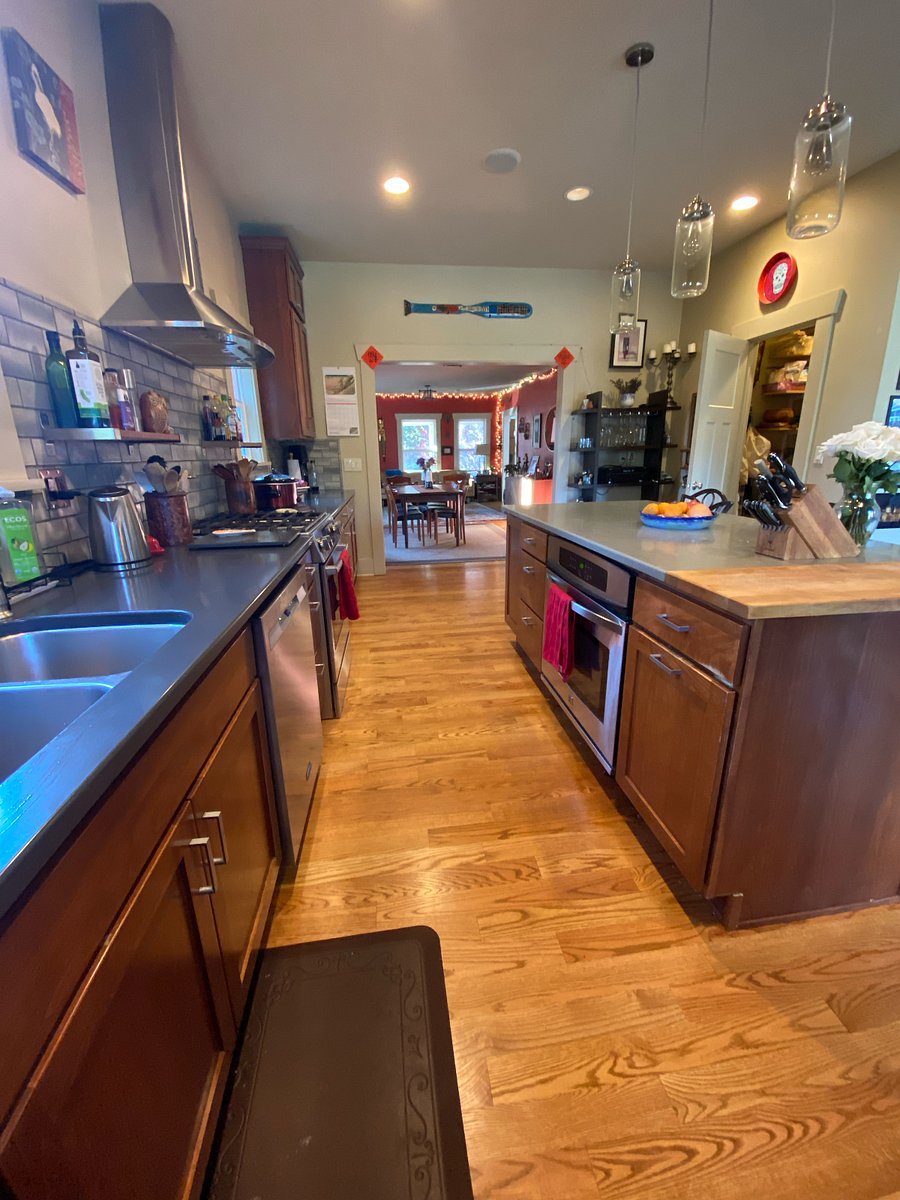 2nd oven in island, large pantry with door open