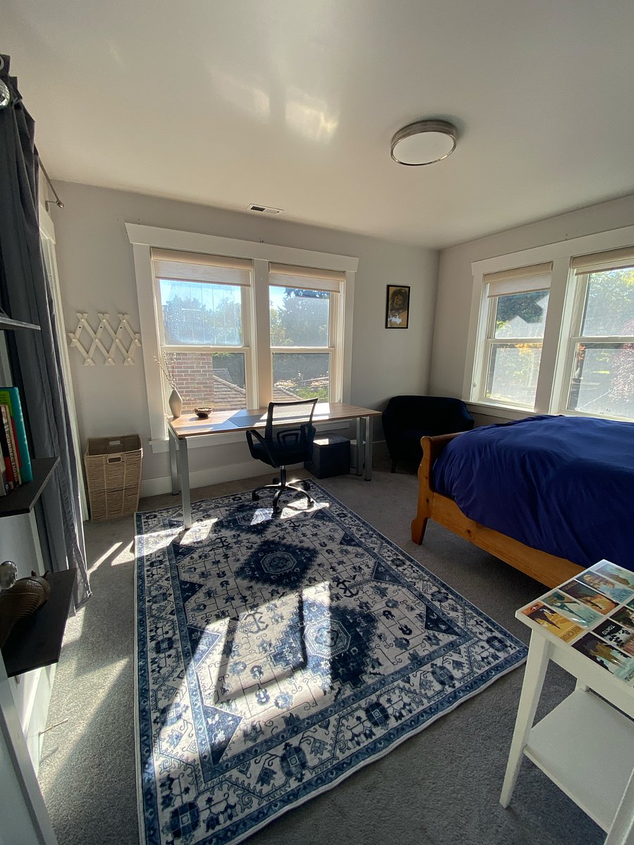 2nd bedroom with desk and sitting chair
