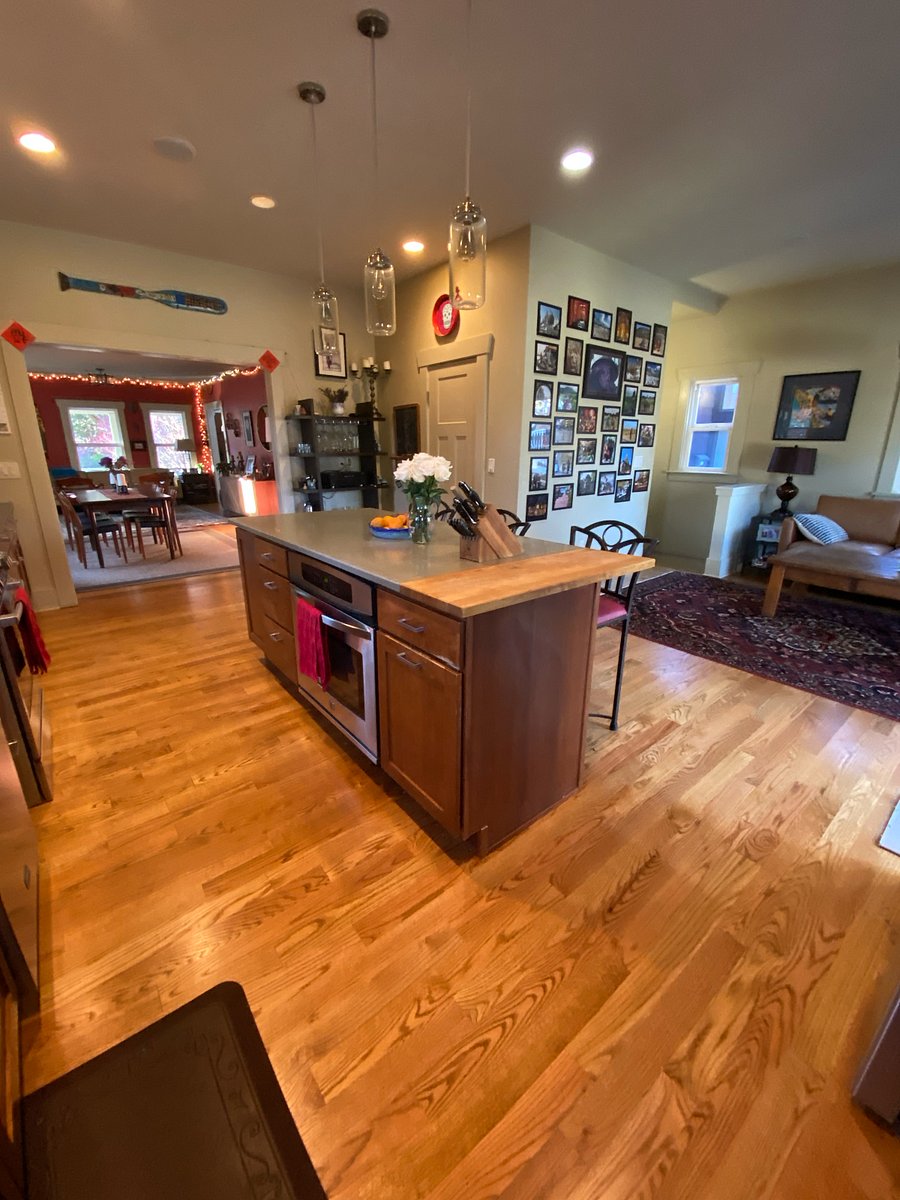 Kitchen with view of living / dining room and couch