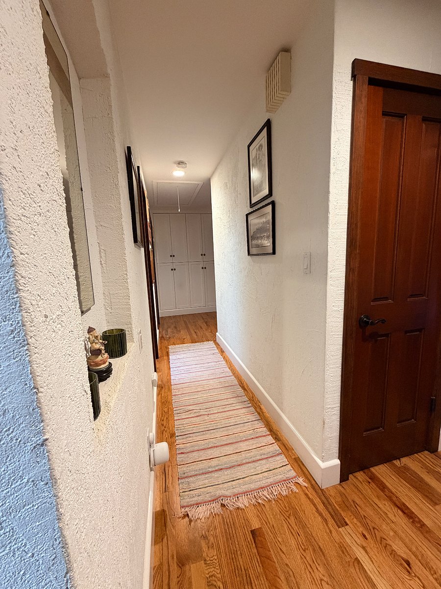 Hallway to other bedrooms and baths