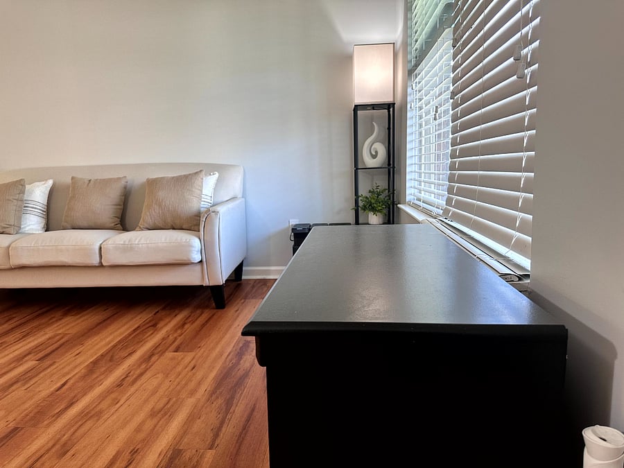 Unwind under warm lighting and enjoy a board game in this space designed for relaxationandplay.
