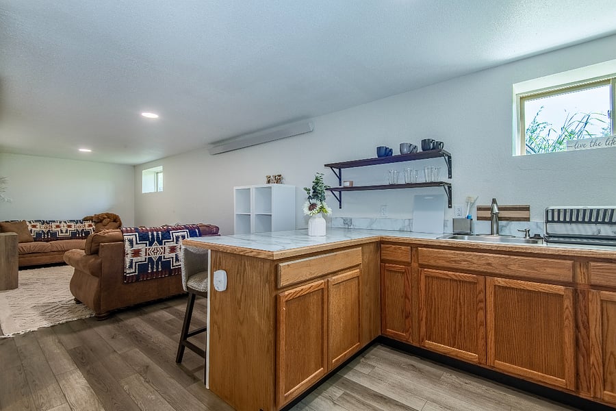 Open kitchen to living area plan.