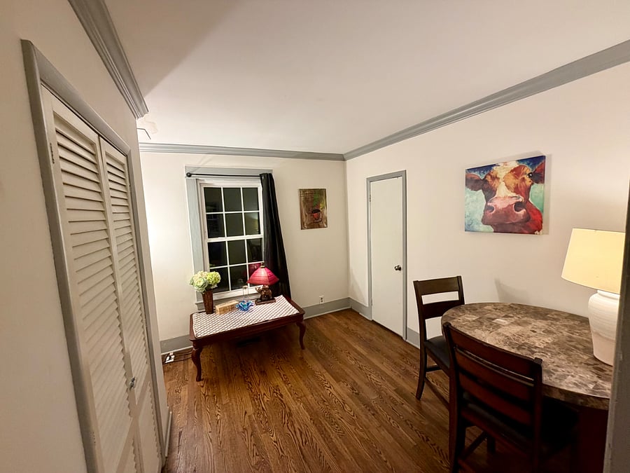 room off of the kitchen with downstairs bathroom