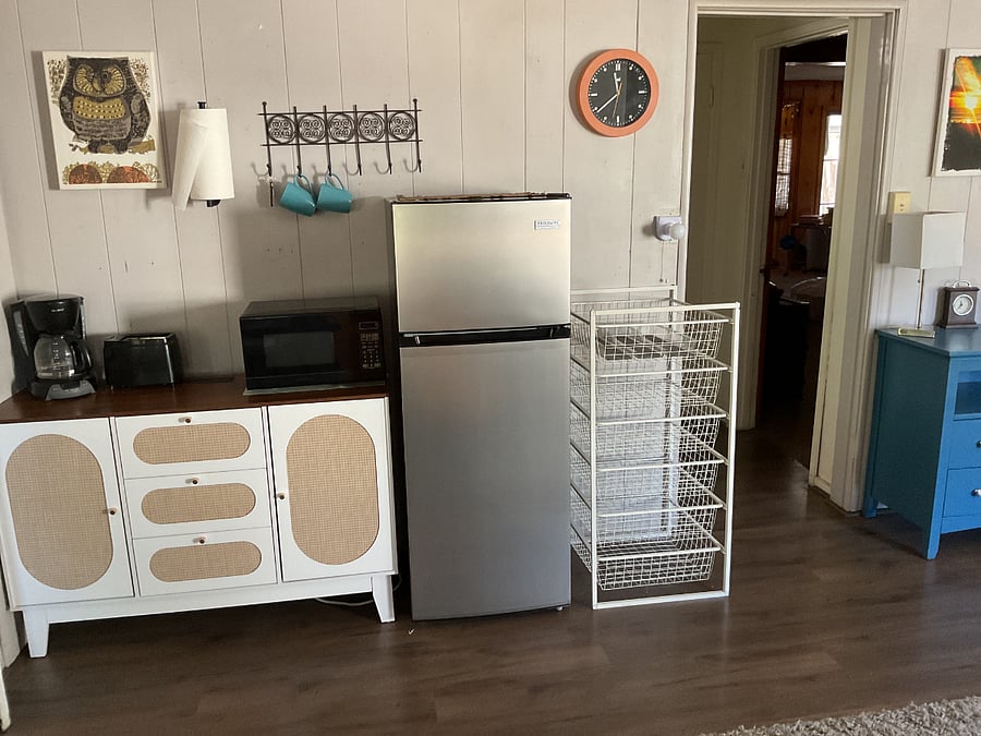 Kitchen area. Stocked with disposable dishes and cutlery. Additional small appliance available for use