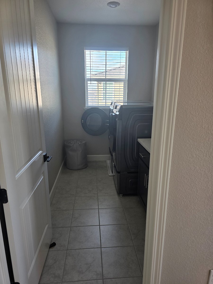 Laundry room located on the second level, conveniently located down the hall from the primary bedroom. 