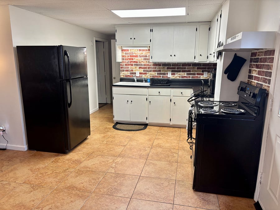 Full kitchen stocked with everything you need. Microwave, Toaster, Blender, Mr Coffee, Pots/Pans, Dishes, Coffee cups, Glasses, Food storage containers, Silverware, Utensils, etc.