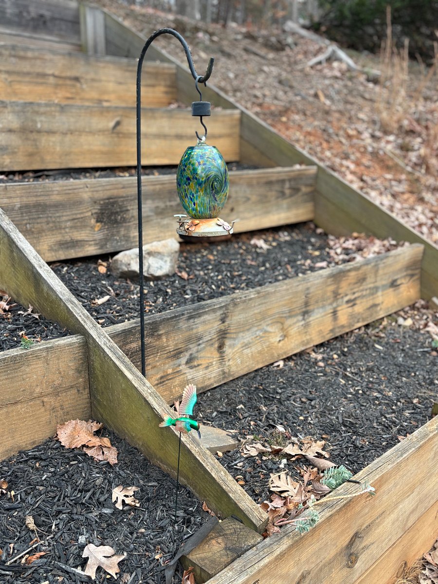Garden located on bank directly beside private parking in front of the main entrance. Tenants are welcome to plant as desired. Gardening tools are located to the right of the front door.
