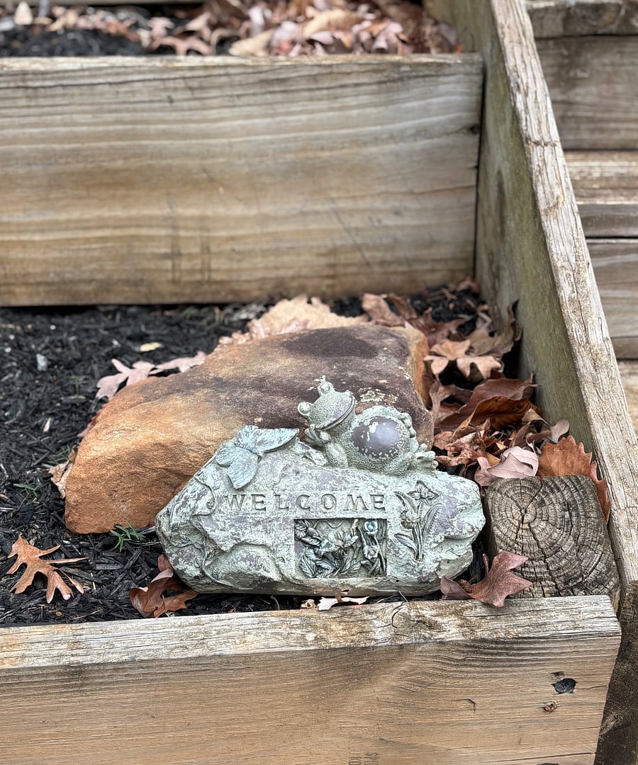 Garden located on bank directly beside private parking in front of the main entrance. Tenants are welcome to plant as desired. Gardening tools are located to the right of the front door.