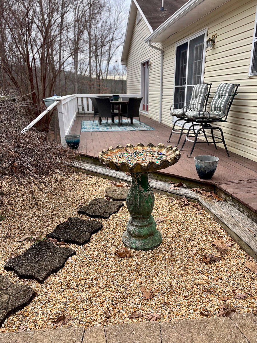 Deck with outdoor dining for 4 and lounge seating. Interior access from dining room or master bedroom. 