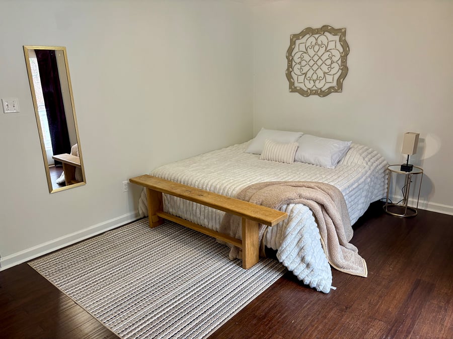 BR 1 - Master with King bed, walk-in closet, and private full bath. French doors lead to deck with outdoor dining and lounge seating.