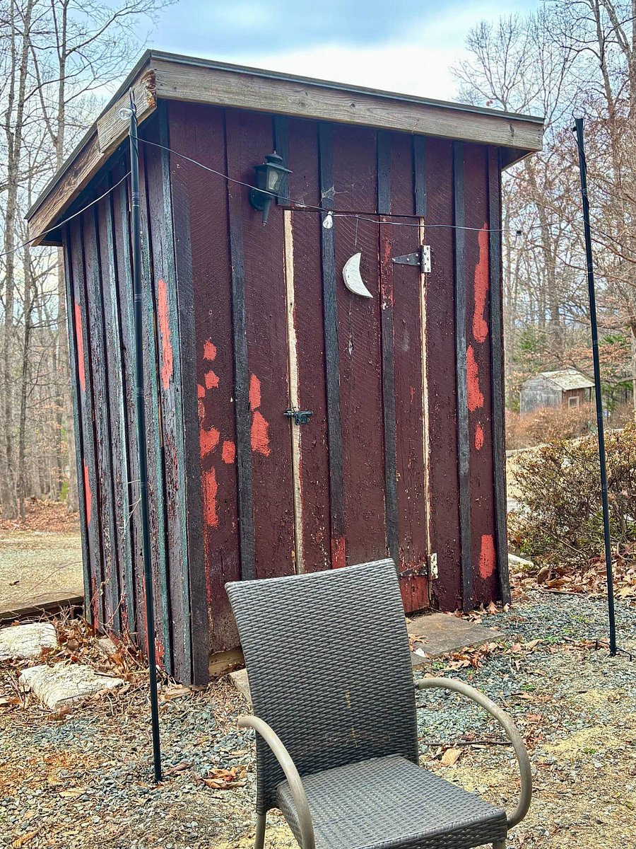 Fire Pitt 2 with bistro table and seating - beautiful sunset view.

Working outhouse with plumbing (toilet/sink) and electric (not available for use in winter months). 