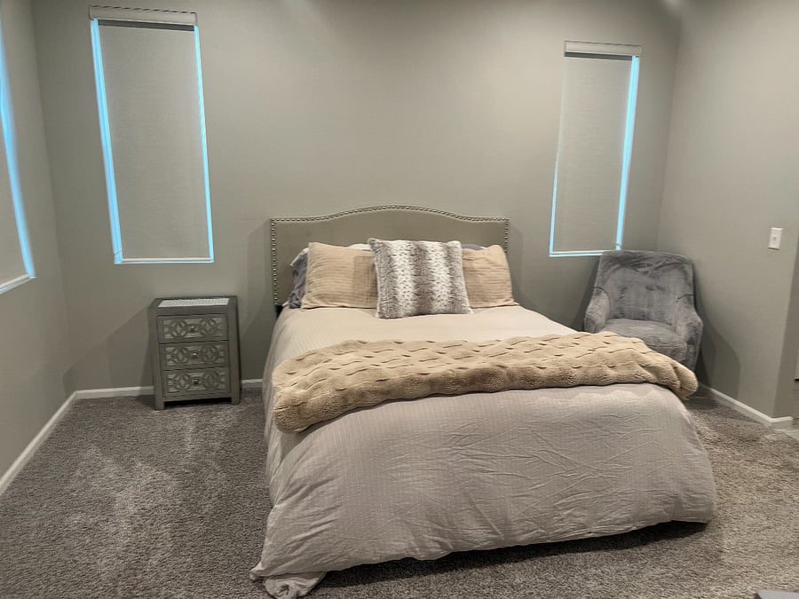 Primary bedroom with queen bed