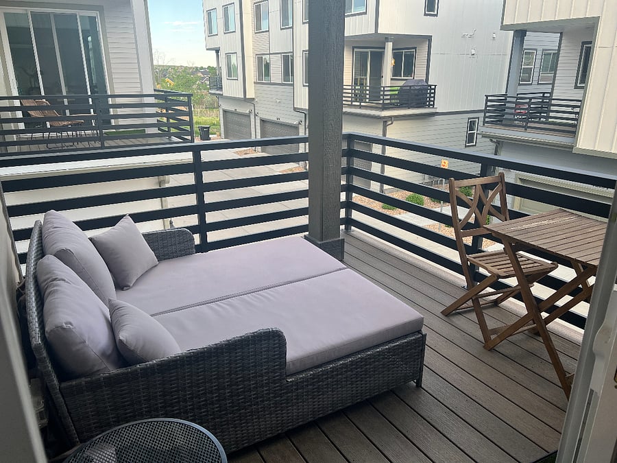Deck off dining room with chaise and seating set