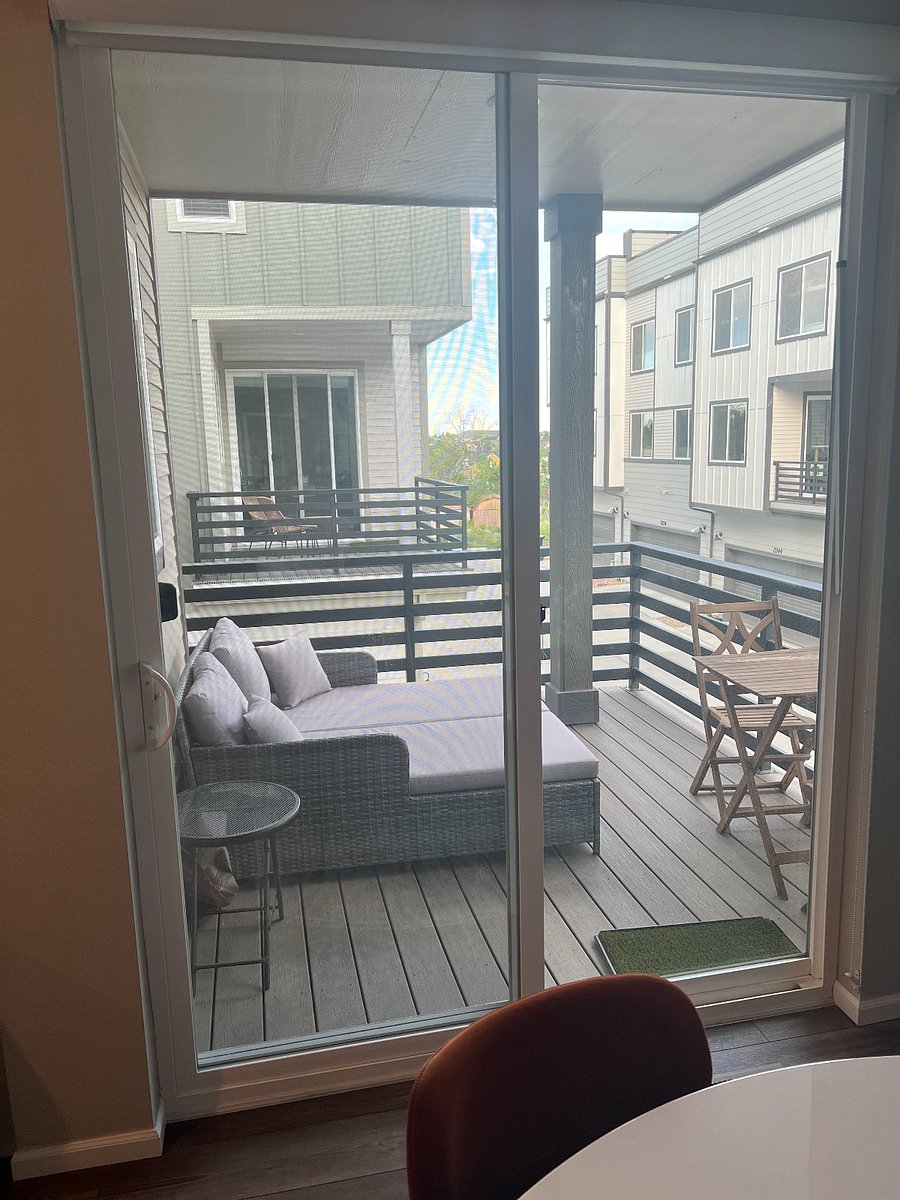 Deck off dining room with chaise and seating set