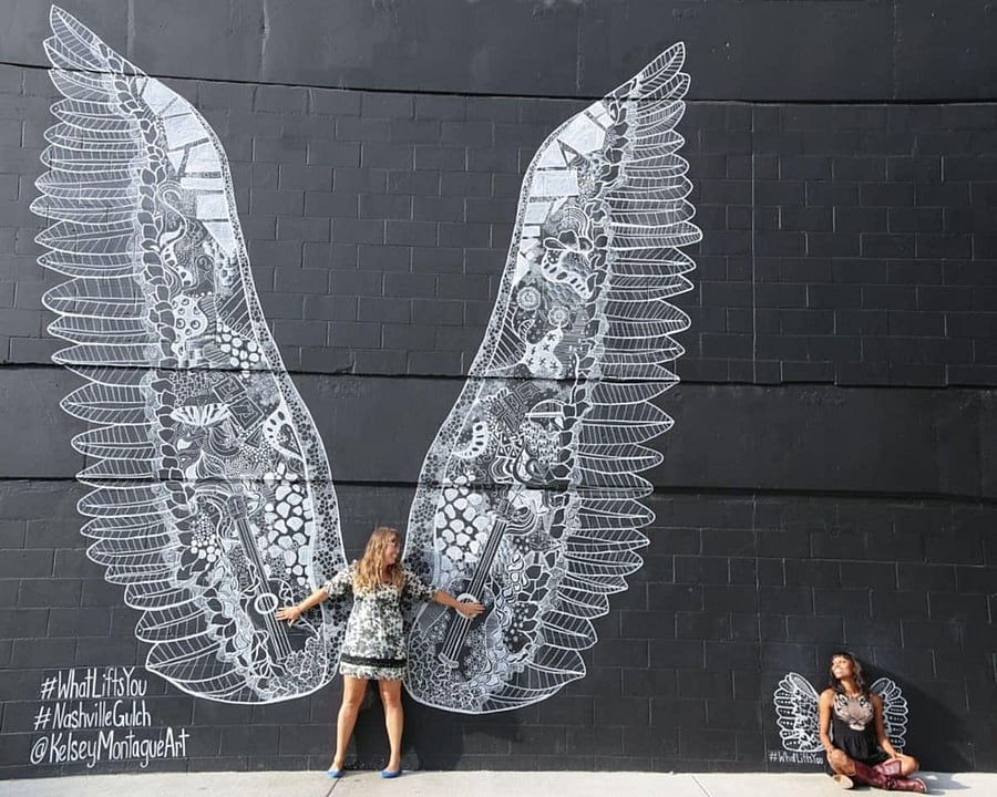 Snag a photo by the famous "wings" mural, just 5 minutes from the home in The Gulch