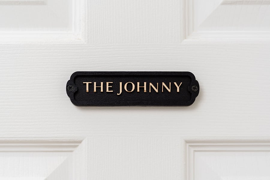 Across the hall from "The Dolly," you'll find the third bedroom ,"The Johnny"