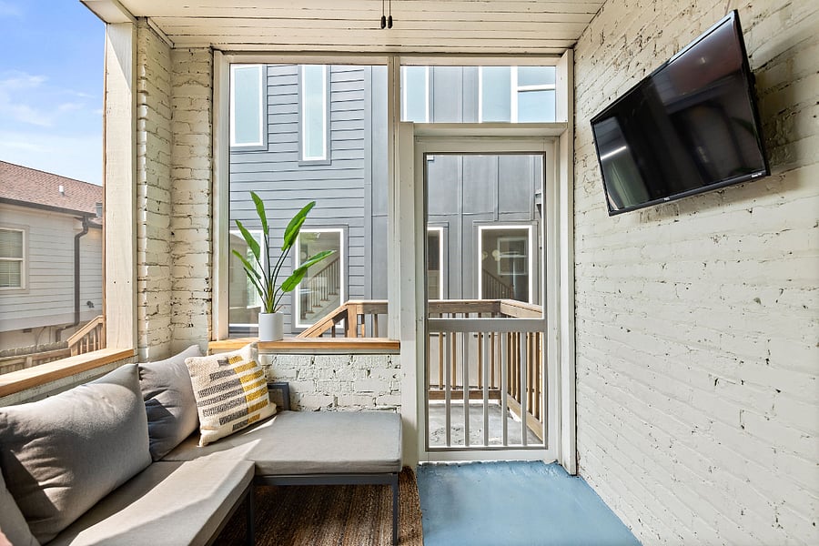 Continuing through the kitchen you'll find our cozy back patio