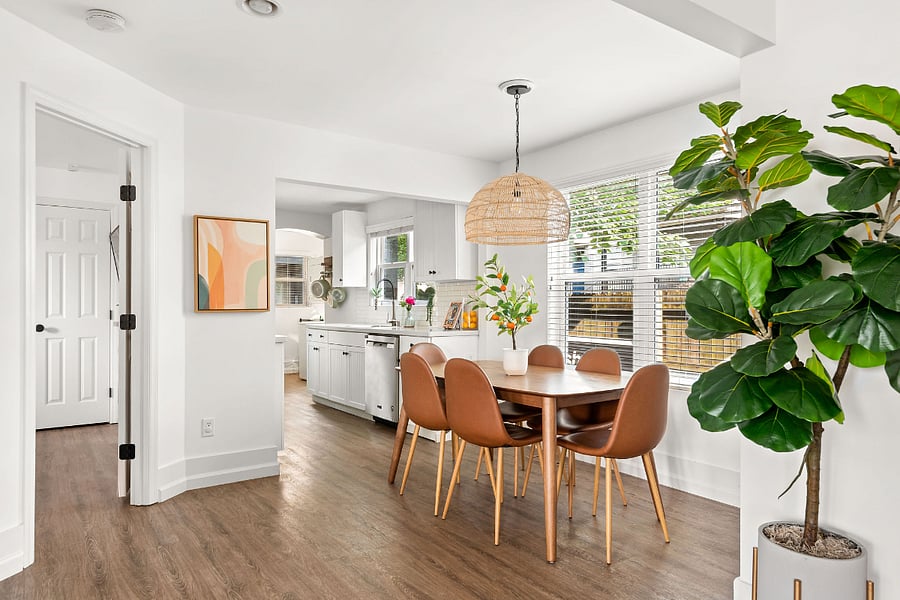 Heading on from the living room, you'll find the dining area with seating for 6