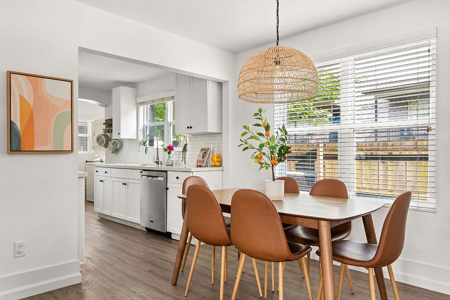Heading on from the living room, you'll find the dining area with seating for 6