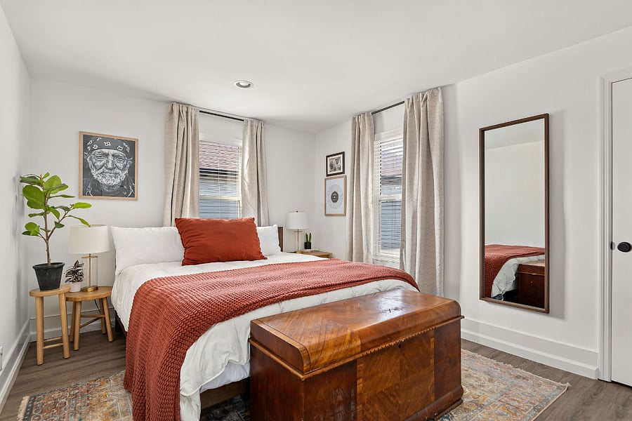 "The Willie" is furnished with a memory foam King size bed, 4 sleeping pillows, a Smart TV, and closet