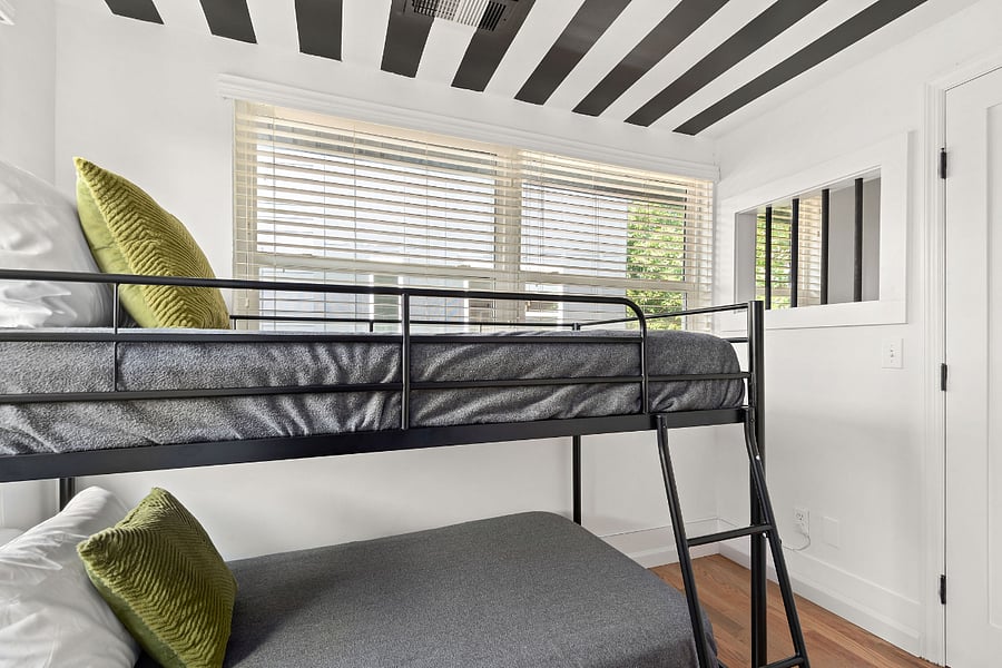 This room is furnished with 2 twin beds, 2 sleeping pillows per bed, and an attached closet