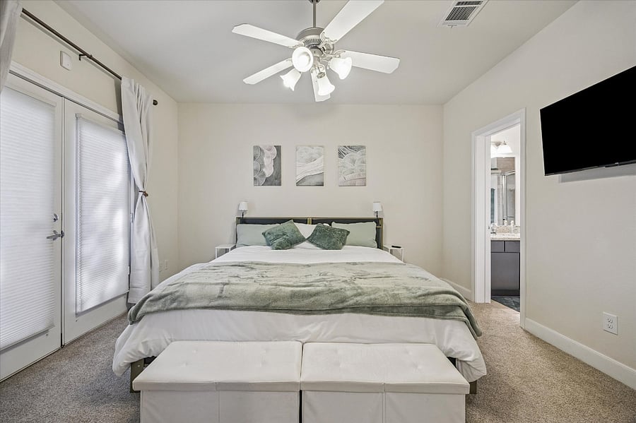 3rd bedroom on bottom floor. Has access to small outdoor area.